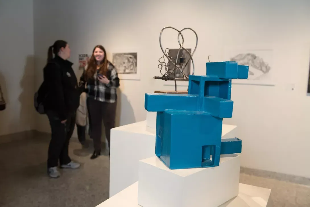 Sculpture made of wood and wire on display in Coburn Art Gallery